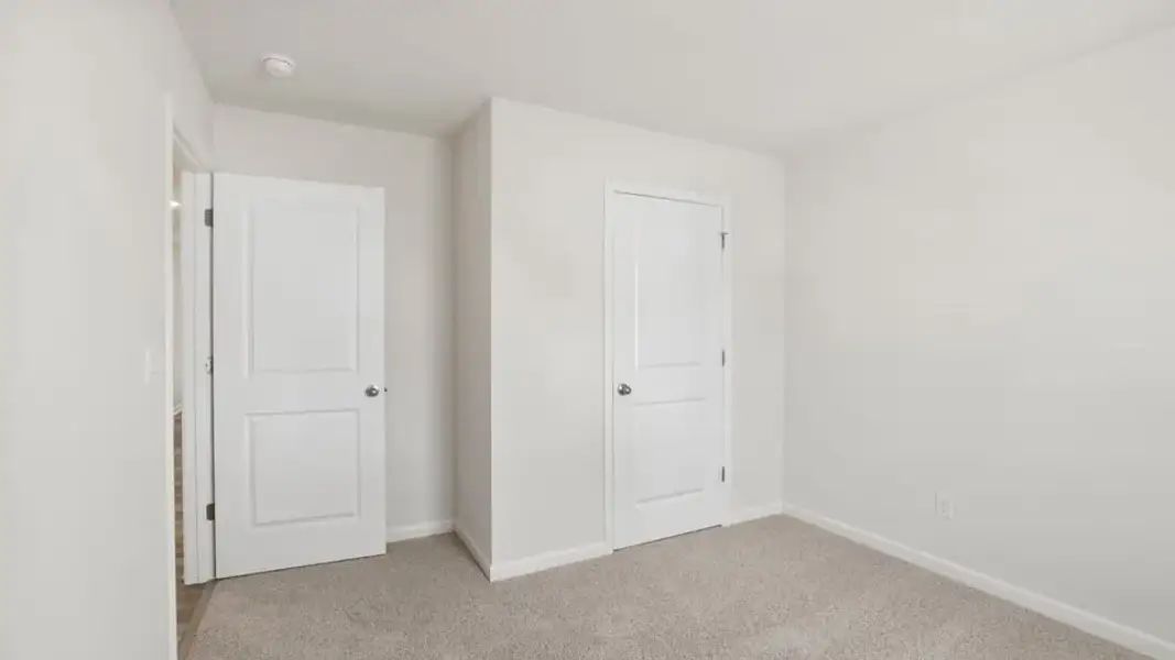 Spacious, unfurnished interior of a new home in Village Grove, Greenville (Image 17).