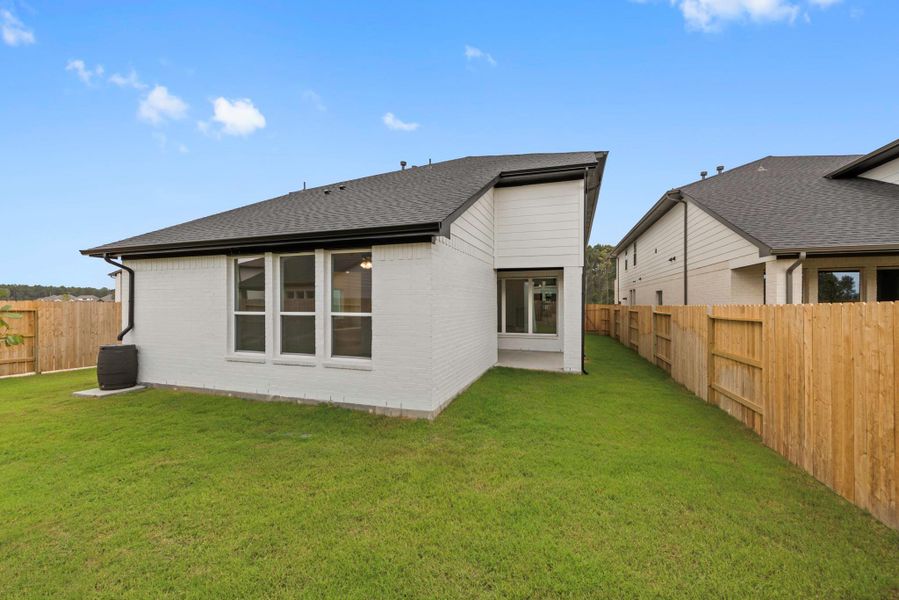 Exterior details and patio area of a home in ARTAVIA®, Conroe (Image 17).