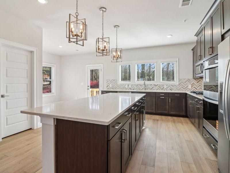 Furnished interior view inside a new home in Martin Springs - Highland Series, Lawrenceville (Image 6).