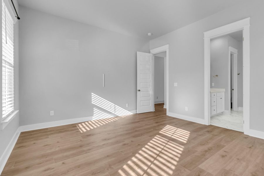 Spacious, unfurnished interior of a new home in Carnes Crossroads: Row Collection, Summerville (Image 28). Spacious, unfurnished interior of a new home in Carnes Crossroads: Row Collection, Summerville (Image 28).