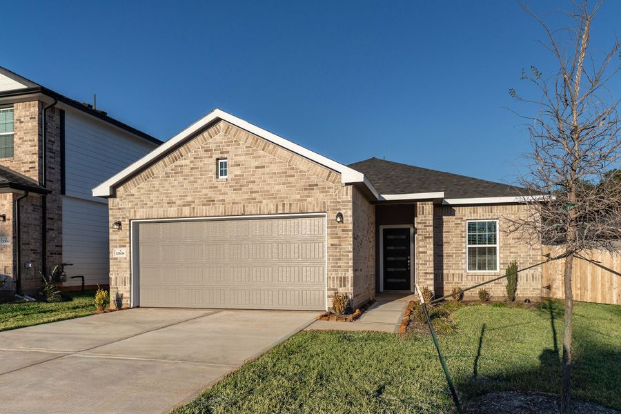 Front exterior of a new home in Cielo, Conroe, TX, highlighting curb appeal (Image 2).