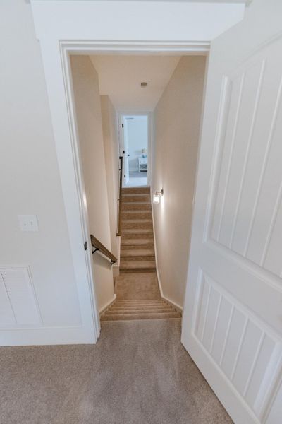 Representative unfurnished interior of a home built from the McKinley by Bill Clark Homes in The Sanctuary at Sunset Beach, Sunset Beach (Image 20). Representative unfurnished interior of a home built from the McKinley by Bill Clark Homes in The Sanctuary at Sunset Beach, Sunset Beach (Image 20).