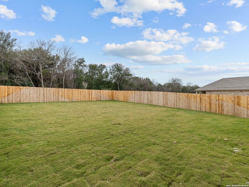 Exterior details and patio area of a home in Royal Crest, San Antonio (Image 19).