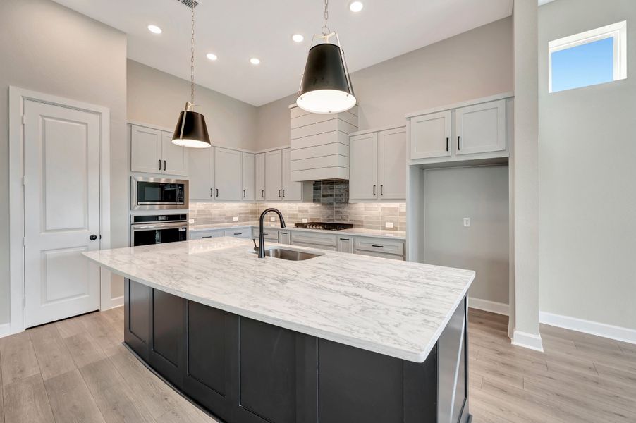 Furnished interior view inside a new home in Harvest Green - Reserve Collection, Richmond (Image 6).