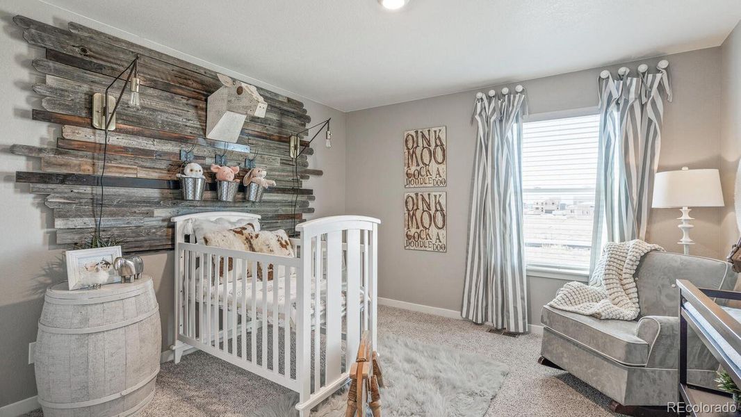 Furnished interior view inside a new home in Trails at Crowfoot, Parker (Image 13).