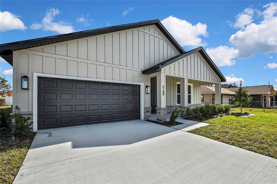 Front exterior of a new home in , Spring Hill, FL, highlighting curb appeal (Image 28).