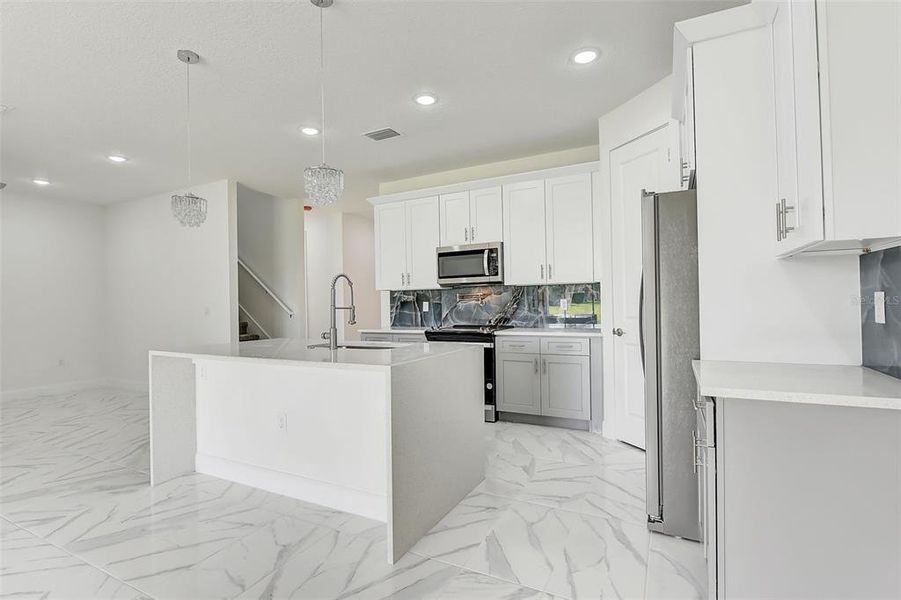 Furnished interior view inside a new home in , Apopka (Image 7).