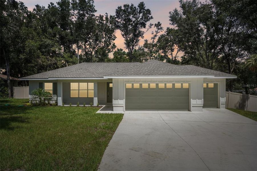 Front exterior of a new home in , Citrus Springs, FL, highlighting curb appeal (Image 24).