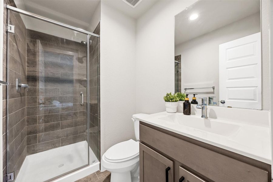 Furnished interior view inside a new home in Sunterra, Katy (Image 23).