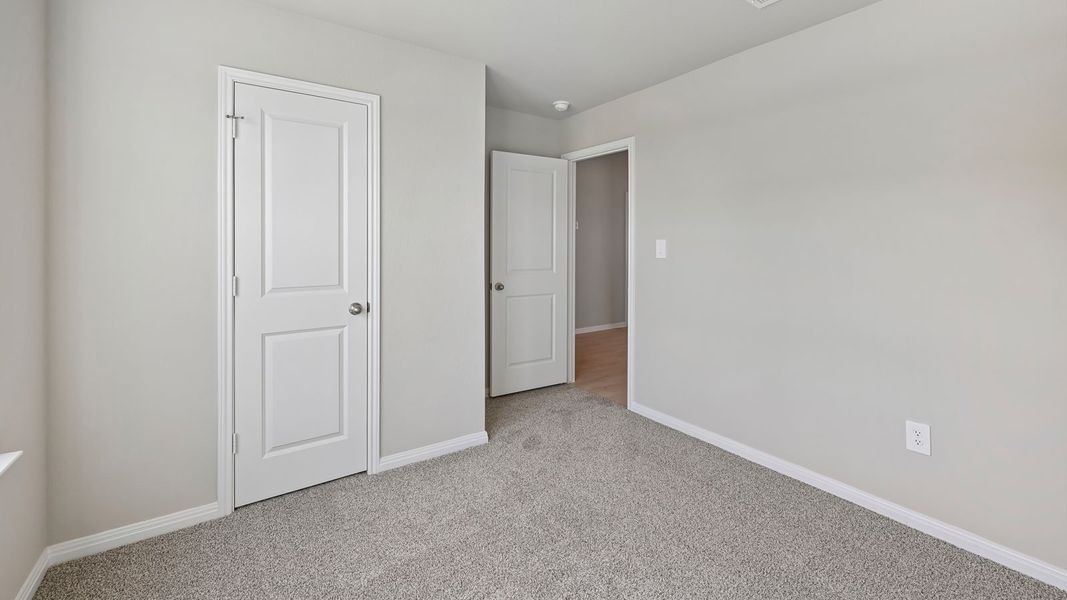 Spacious, unfurnished interior of a new home in Carillon, Manor (Image 25).