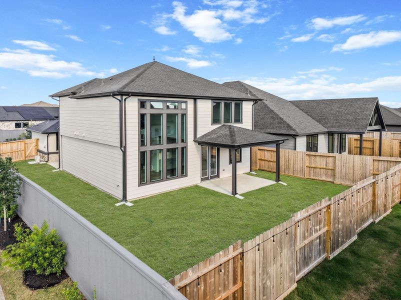 Exterior details and patio area of a home in Jubilee 45', 70', Hockley (Image 14).