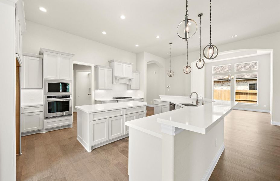 Furnished interior view inside a new home in The Woodlands Hills 65′, Willis (Image 12).