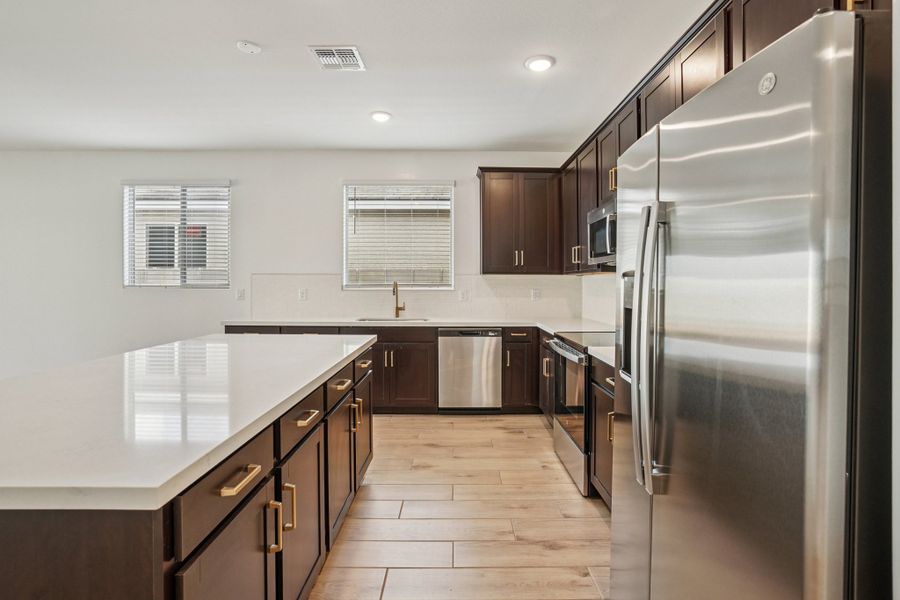 Kitchen featuring the Oxford Collection. Finishes and colors may vary by community.