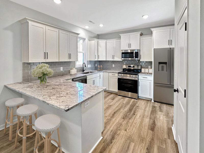 Furnished interior view inside a new home in River Hills, Shallotte (Image 5).
