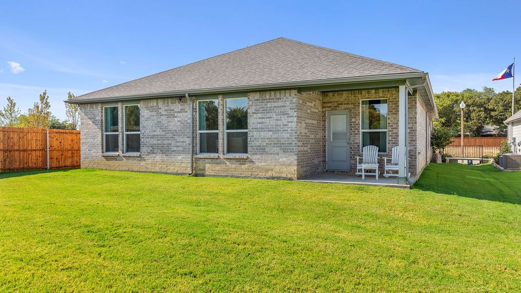 Exterior details and patio area of a home in Eagle Creek, Denton (Image 3). Exterior details and patio area of a home in Eagle Creek, Denton (Image 3).