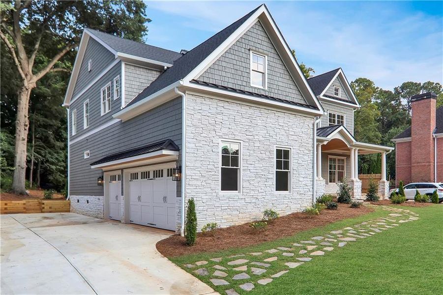 Front exterior of a new home in , Decatur, GA, highlighting curb appeal (Image 24).