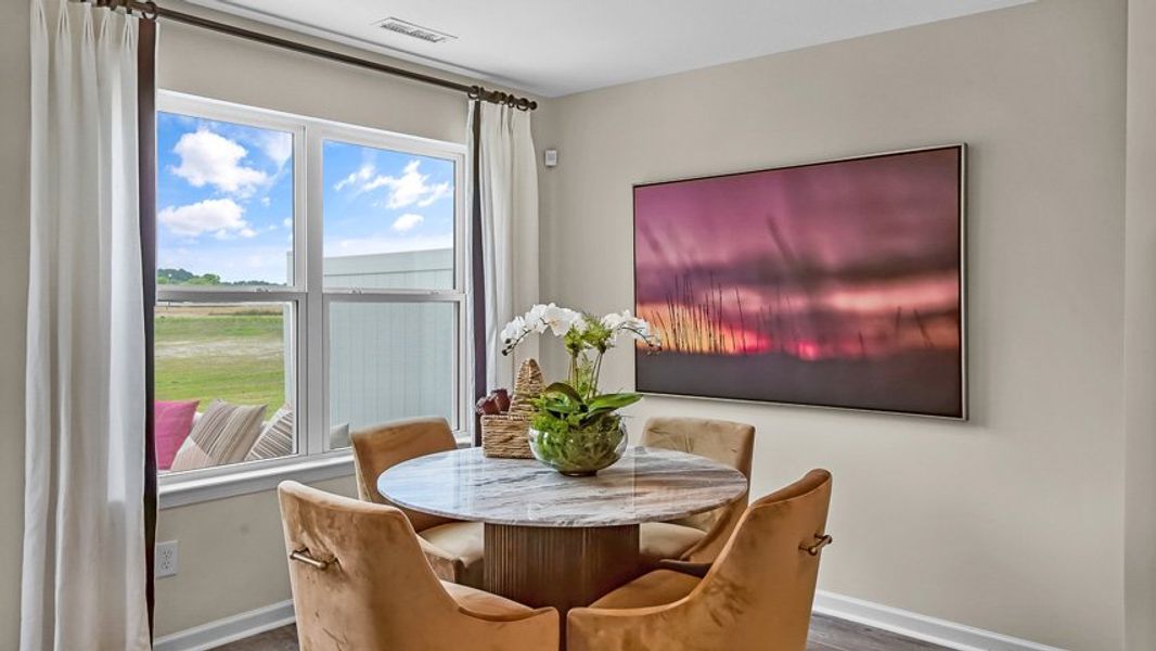 Furnished interior view inside a new home in North Village Townes, Greensboro (Image 6).