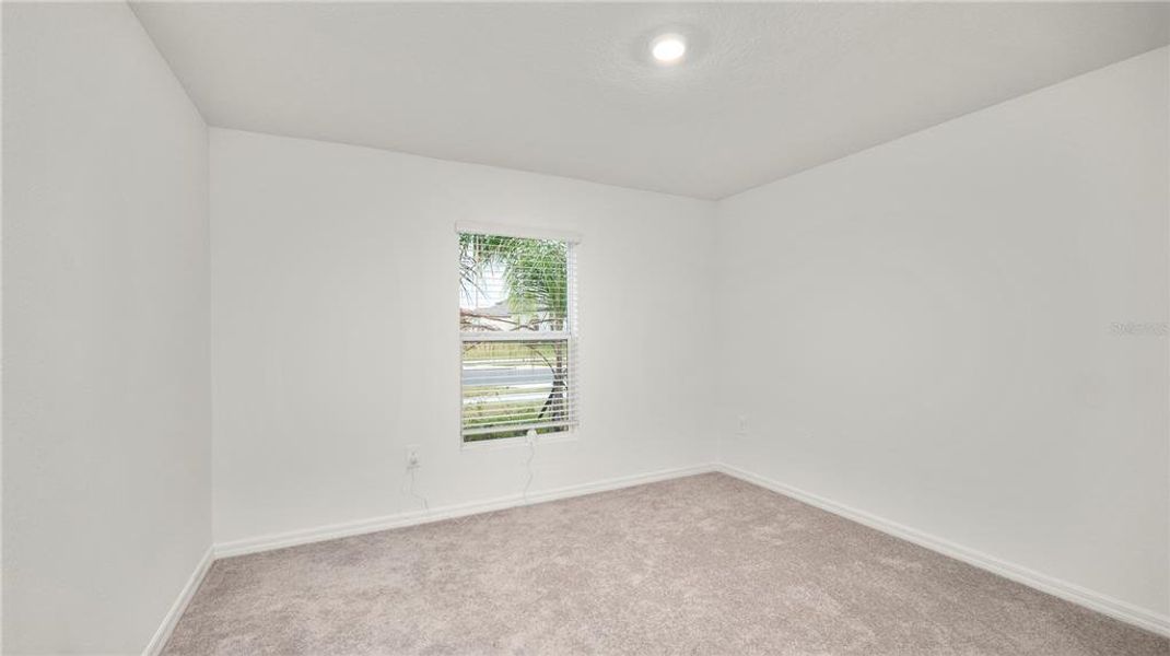 Spacious, unfurnished interior of a new home in Cypress Point at Lake Parker: The Estates, Lakeland (Image 33).