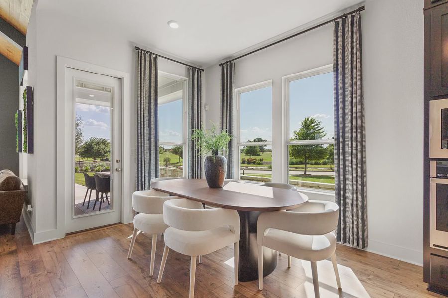 Representative furnished interior of a home built from the Madison by Chesmar Homes in Lakes of Cane Island, Katy (Image 6).