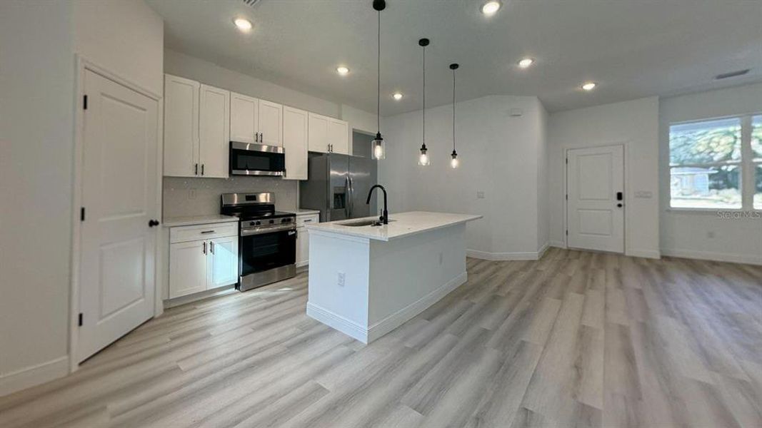 Furnished interior view inside a new home in , Dunnellon (Image 7).
