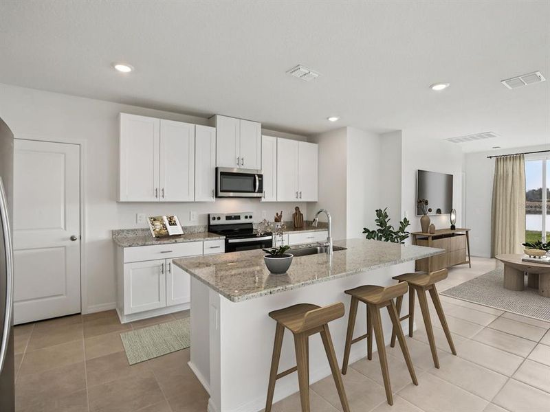 Furnished interior view inside a new home in Oakfield Trails - Premier Series, Parrish (Image 7).
