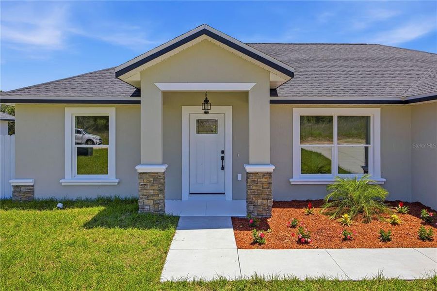 Exterior details and patio area of a home in , Ocala (Image 4).