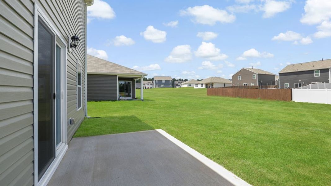 Exterior details and patio area of a home in Bentley Park, Greenwood (Image 4).