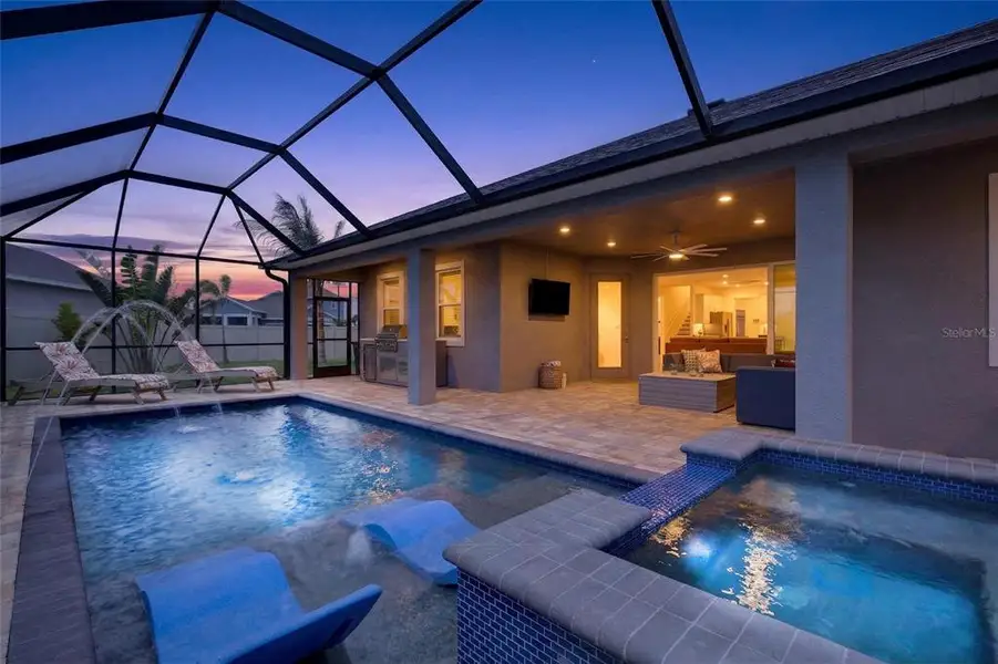 Exterior details and patio area of a home in Seaire, Parrish (Image 37).