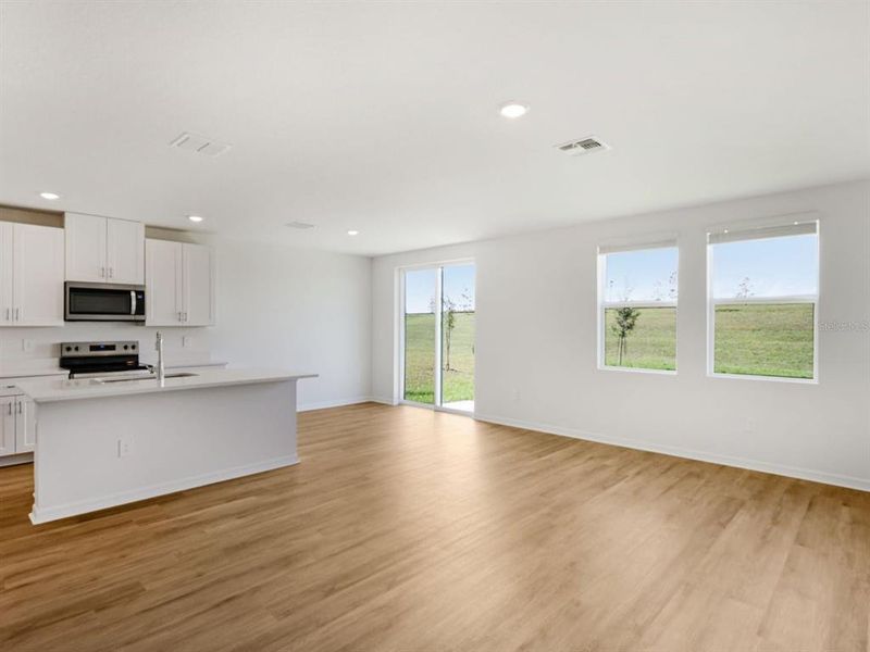 Spacious, unfurnished interior of a new home in The Reserve at Van Oaks, Auburndale (Image 22).