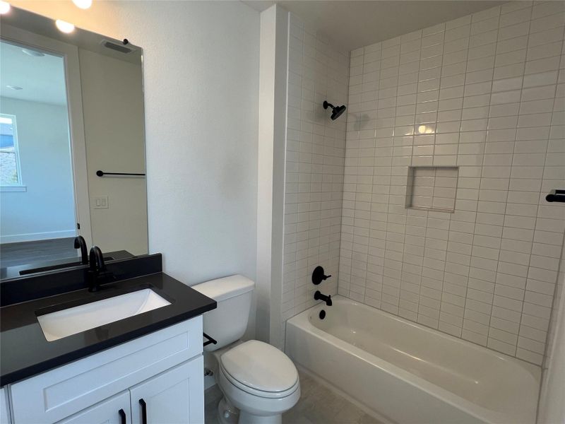 Furnished interior view inside a new home in The Grove, Austin (Image 17). Furnished interior view inside a new home in The Grove, Austin (Image 17).