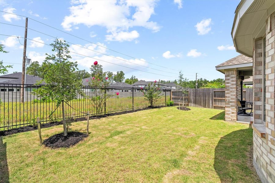 Beyond the back fence sits open green space, giving you that extra breathing room and unobstructed view that is harder to find than you think. Beyond the back fence sits open green space, giving you that extra breathing room and unobstructed view that is harder to find than you think.