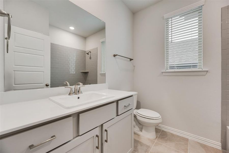 Furnished interior view inside a new home in Villages of Hurricane Creek, Anna (Image 9).