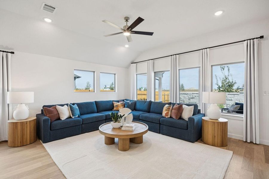 Living Room in the Diamond home plan by Trophy Signature Homes – REPRESENTATIVE PHOTO
