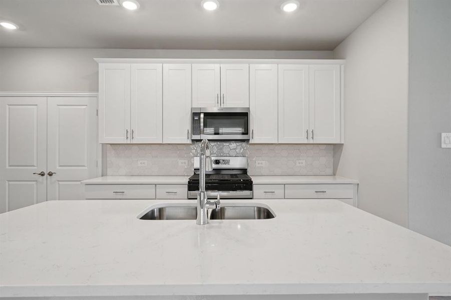 Photo is not of the actual home, but is an inspirational photo of builder’s model home and may depict options, furnishings, and/or decorator features that are not included.