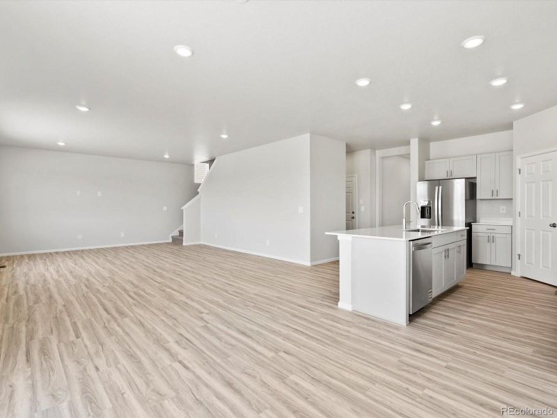 Spacious, unfurnished interior of a new home in Ridgeline Vista: The Canyon Collection, Brighton (Image 29).