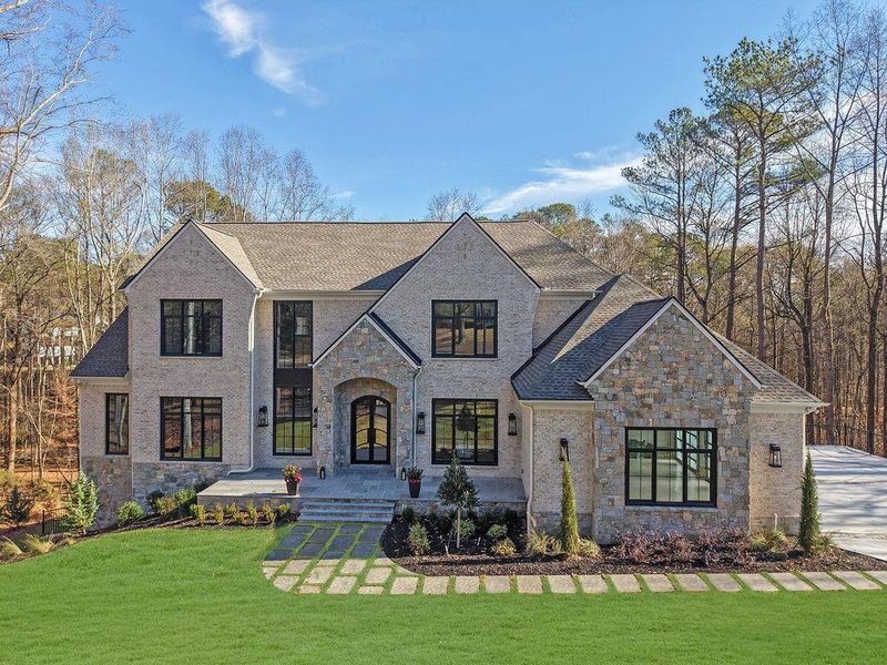 Front exterior of a new home in , Johns Creek, GA, highlighting curb appeal (Image 25).