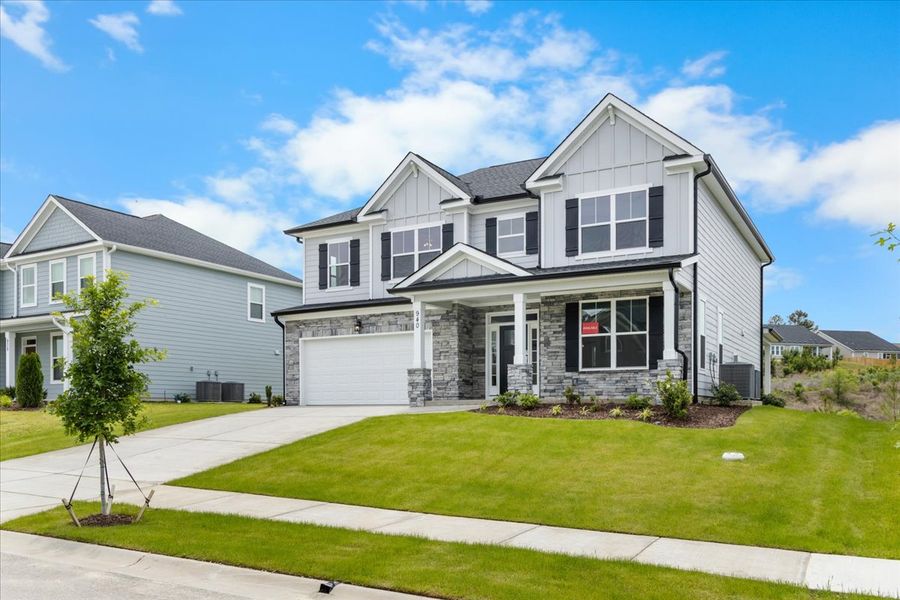 Front exterior of a new home in Crawford Creek, Grovetown, GA, highlighting curb appeal (Image 27). Front exterior of a new home in Crawford Creek, Grovetown, GA, highlighting curb appeal (Image 27).