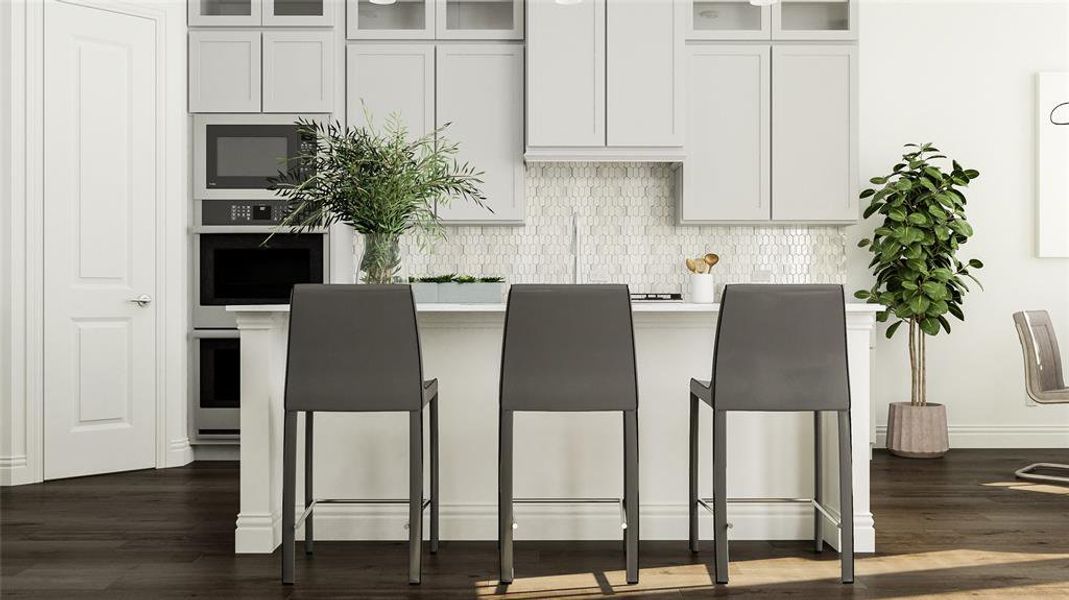 Kitchen featuring white cabinets, dark hardwood / wood-style floors, tasteful backsplash, and oven