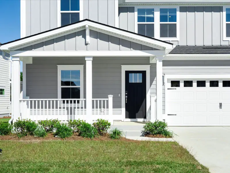 Exterior details and patio area of a home in The Coves at Lakes of Cane Bay, Summerville (Image 3).