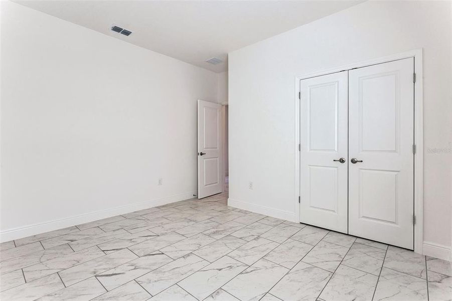 Spacious, unfurnished interior of a new home in Villa Pass, Mascotte (Image 20). Spacious, unfurnished interior of a new home in Villa Pass, Mascotte (Image 20).