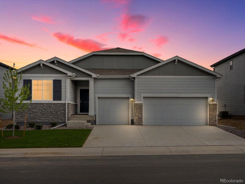 Front exterior of a new home in Poudre Heights: The Alpine Collection, Windsor, CO, highlighting curb appeal (Image 1).