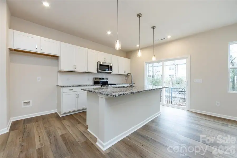 Kitchen with large island perfect for entertaining