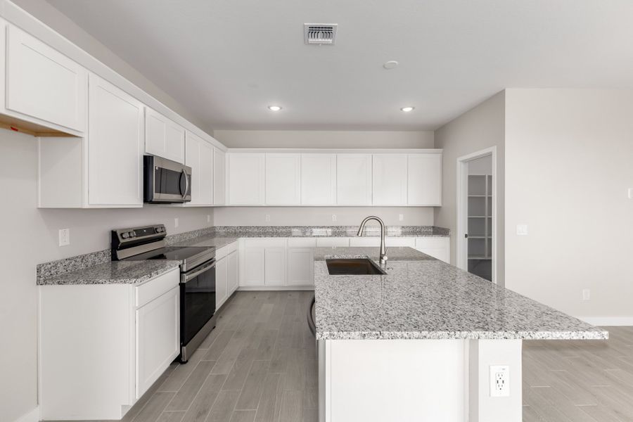 Furnished interior view inside a new home in Bentridge, Buckeye (Image 3).