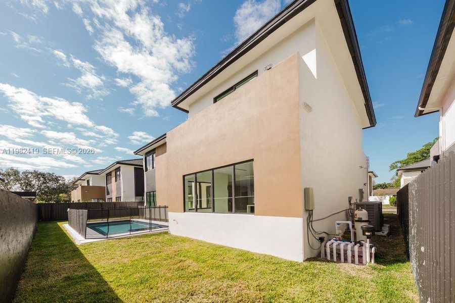 Exterior details and patio area of a home in , Miami (Image 4).