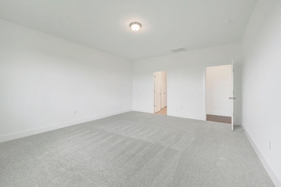 Spacious, unfurnished interior of a new home in McAlister Creek, Clayton (Image 22).