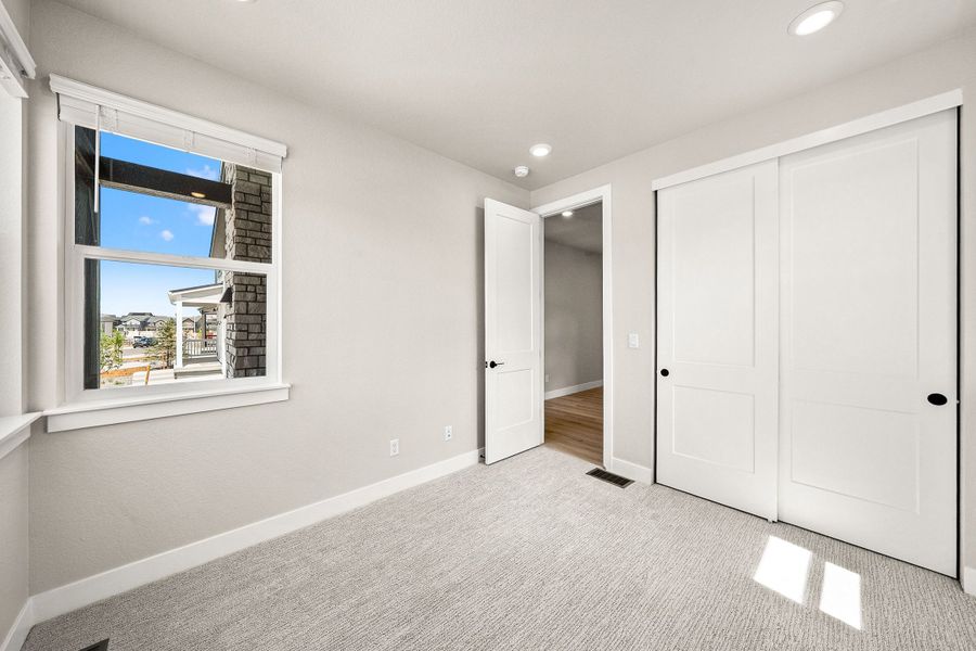 Spacious, unfurnished interior of a new home in Trumark Homes at Sterling Ranch, Littleton (Image 30).