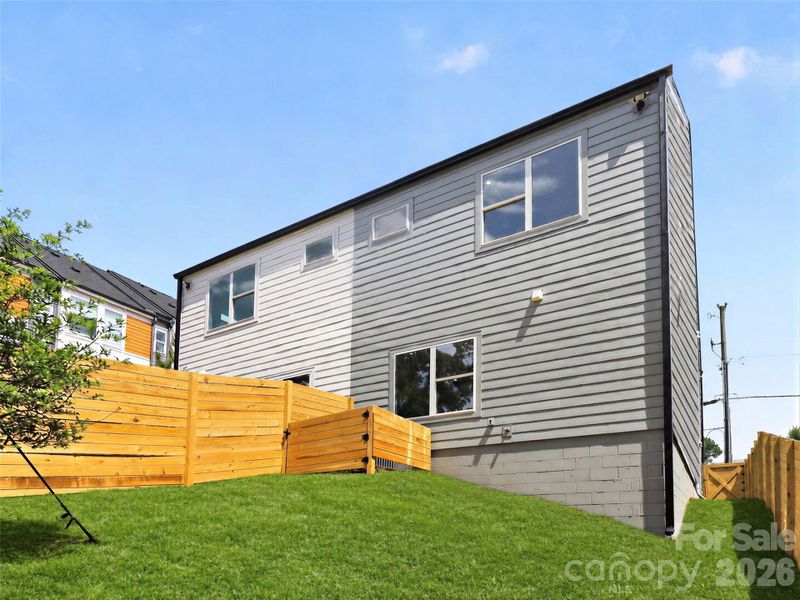 Fenced rear yard, lawn virtually enhanced Fenced rear yard, lawn virtually enhanced