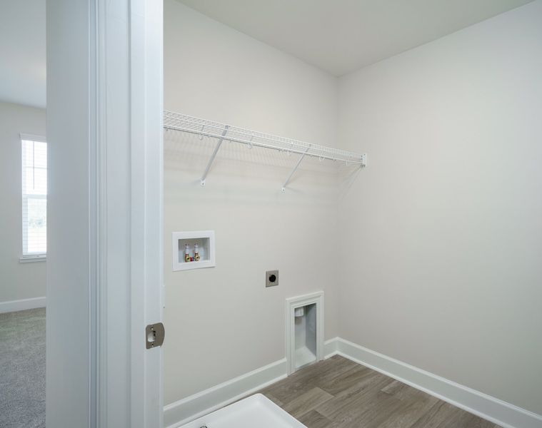 Representative furnished interior of a home built from the The Kennedy by Cothran Homes in Holly Ridge, Greenville (Image 18).