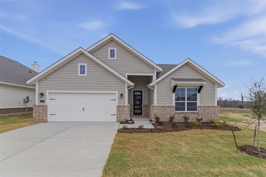 Front exterior of a new home in Covenant Park, Springtown, TX, highlighting curb appeal (Image 16).