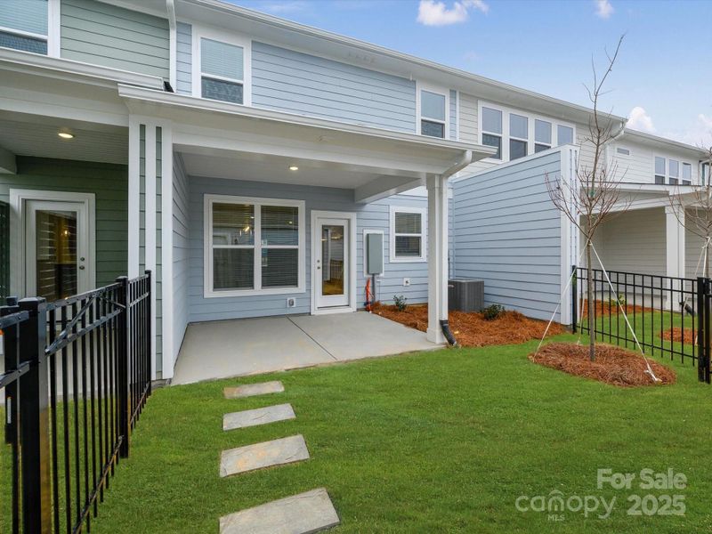 Exterior details and patio area of a home in North Creek Village, Huntersville (Image 18).